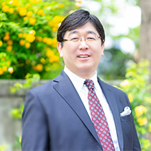 代表・富永